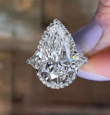 12.4 CT Pear E VS1 Lab Grown 3-Stone Halo with Trillion Diamond Anniversary Ring - Image 1 of 4