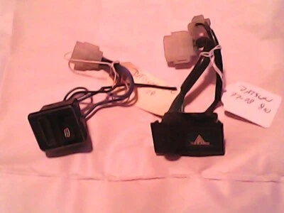 DATSUN HAZARD SWITCH and REAR DEFOGGER SWITCH DATSUN 810. . .  1977-78 - Image 1 of 4
