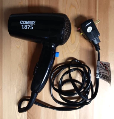 Secador de pelo plegable Conair cable de viaje 1875 vatios cable retráctil Foto 1 de 4