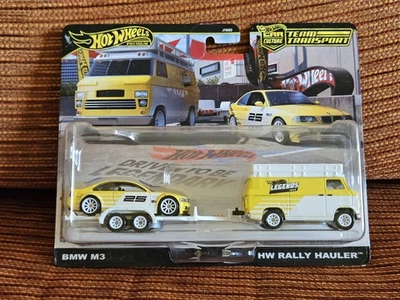 # 1/64 HOT WHEELS TEAM TRANSPORT LEGENDS - BMW M3 + HW RALLY HAULER # - Immagine 1 di 2