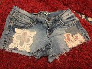 Grane supergirl Juniors Short Shorts Cut Off Distressed Look Patchwork Size 1 - Picture 1 of 6