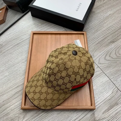 NEW Authentic Gucci beige GG Monogram Leather Trim Hat  Size M - Image 1 of 4