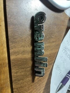 Gremlin Emblem Nameplate script exterior Trim amc 1 or more 3672128 - Picture 1 of 3