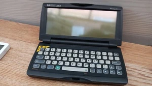 Hewlett Packard HP 320LX Palmtop, Cradle, Stylus & Charger - Picture 1 of 4