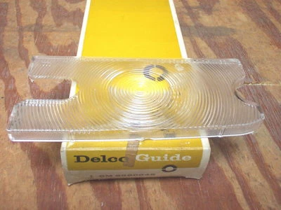 Oldsmobile Delta 88 1968 noventa y ocho lente de lámpara de estacionamiento Delco-Guide #5960045 nuevo en stock Foto 1 de 2