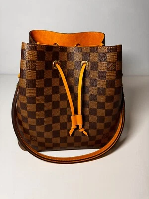 Auténtico bolso cubo Louis Vuitton Neo Noe Damier Level en azafrán Foto 1 de 4