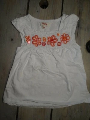 T-shirt débardeur blanc sans manches brodé fleurs orange et fuchsia Taille 5 ans - Photo 1/3