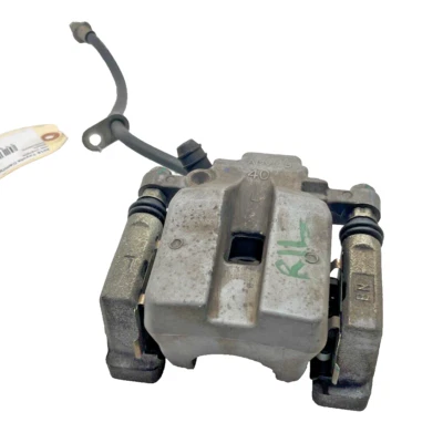 Toyota Camry 2018-2023 conjunto de pinza de freno de disco trasero izquierdo del lado del conductor OEM Foto 1 de 4