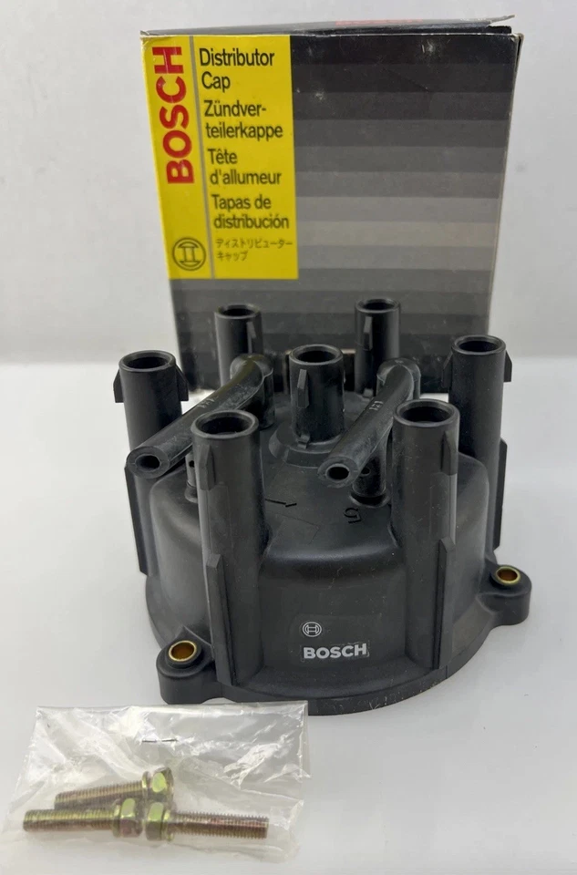 Tapa de distribuidor Bosch - 03384 con pernos para Toyota Camry y Lexus ES300 Foto 1 de 4