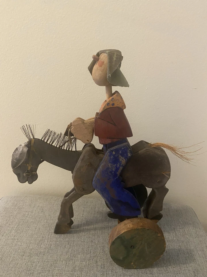 Antiguo arte popular caballo y jinete Foto 1 de 4