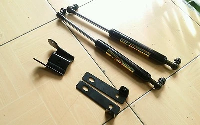 MITSUBISHI TRITON ML MN L200 05-14 FRONT HOOD BONNET SHOCK UP LIFTER GAS STRUTS - Image 1 of 4