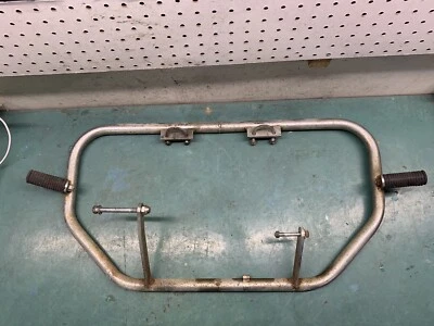 Honda CB750 K4 1974 barra de choque protector de motor clavijas de carretera reposapiés original Foto 1 de 4