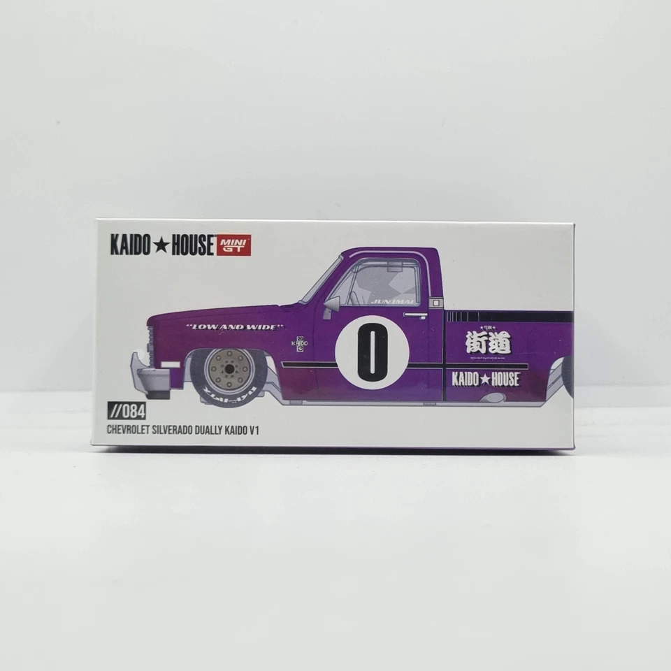 MINI GT KAIDO HOUSE CHEVROLET SILVERADO DUALLY KAIDO V1 VIOLA KHMG084 SIGILLATO - Immagine 1 di 4