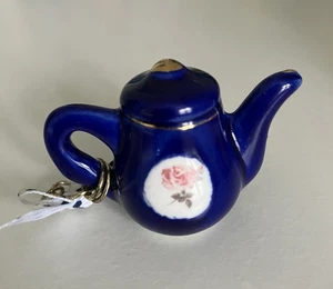 BLUE CERAMIC TEAPOT PENDANT WITH PAINTED ROSES AND RIBBON TRIM - Picture 1 of 3