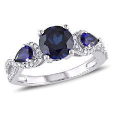 Amour Sterling Silver Created Sapphire and 1/6CT TDW Diamond 3-Stone Ring