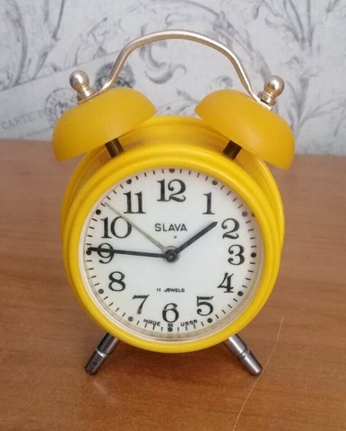 SLAVA Antique alarm clocks Table clock yellow. Rare! Good vintage Cover