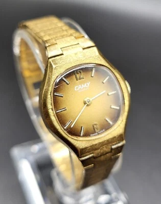 Vintage Anos 70 Relógio Suíço Camy Geneve Tom Dourado Feminino Corda Analógico 22 mm - Imagem 1 de 4