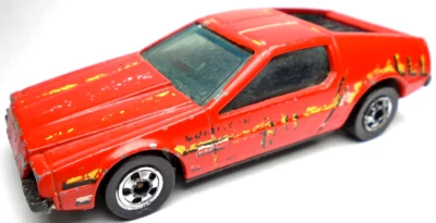 1979 HOT WHEELS DELOREAN #10 RED 1:64 DIECAST 2 3/4" RACE CAR W/ YELLOW & WHITE - Image 1 of 4