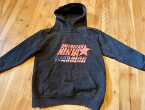 AMERICAN NINJA WARRIOR HOODIE Premium KIDS L Large (Boy) Sweater Excellent - Picture 1 of 4