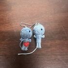 Small Voodoo Doll blue character ear rings in good condtion