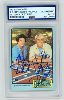 JOHN SCHNEIDER & TOM WOPAT Signed 1980 Donruss Dukes of Hazzard Card 13 PSA AUTO - Image 1 of 2