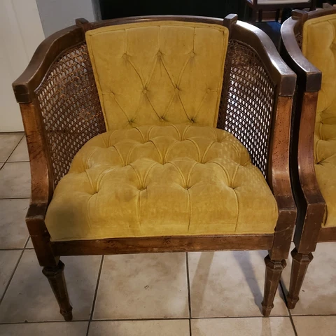 Pair of Mid Century Modern Gold Tufted Accent Chairs with Caning. Mahogany Cover