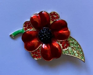 HERMOSO BROCHE FLOR ROJA DIAMANTADA Y ESMALTE METAL TONO DORADO - Imagen 1 de 2