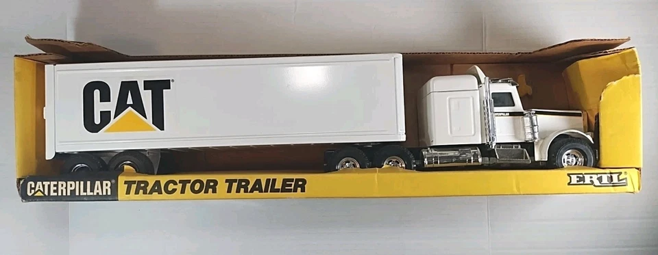Винтажный ERTL CAT Caterpiller 1/25 Полутрактор Прицеп 7710 Новый в коробке РЕДКИЙ 1989 - Изображение 1 из 4
