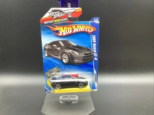 Nissan GT-R 2009 Nightburnerz Hot Wheels negro con llavero RW - Imagen 1 de 4