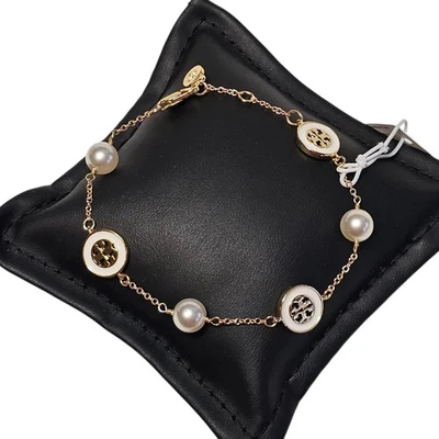 Brazalete Tory Burch Chapado en Oro 18k Blanco TB Logo Perla Delicado Nuevo Foto 1 de 4