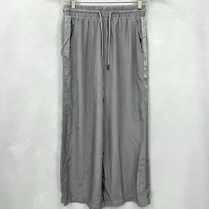 Pantaloni di seta ATM donna XS coulisse silenziosi lusso boho gamba larga fluidi Aritzia - Foto 1 di 15