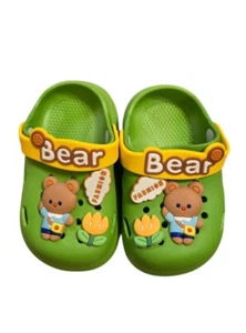 Clogs Slip on Sandals For a Toddler Boy or Girl of Figures on a Garden. - Picture 1 of 3