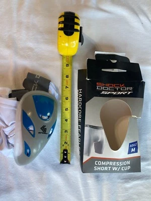 "Shorts de compresión deportivos Shock Doctor para adultos con copa protectora 31""-37""" Foto 1 de 4