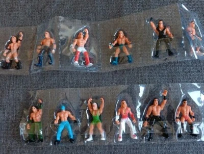 Lote de 12 mini figuras de acción WWE Micro Aggression 2" Jakks Pacific 2006 Cena Foto 1 de 4