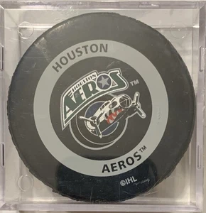 HOUSTON AEROS IHL HOCKEY "OFFICIAL GAME PUCK" NEU IN TRANSPARENTER QUADRATISCHER KUNSTSTOFFHÜLLE - Bild 1 von 2