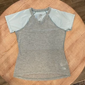 The North Face Damen S Kurzarm Shirt V-Ausschnitt blau grau Raglan - Bild 1 von 10