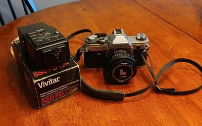 Kit de cámara Canon AT-1 SLR con lente 50 mm f1,8 #513 con flash 550 FD C/R Foto 1 de 4