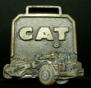 Raupe CAT Schaber Traktor PERKINS MASCHINE Werbeuhr Anhänger Blätter - Bild 1 von 2