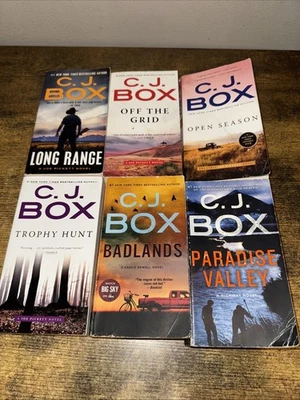 C.J. Box lot of 6 paperback books, 4 are from the Joe Pickett Series. - Image 1 of 2