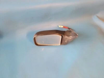 85 86 87 88 ESPEJO RETROVISOR LATERAL IZQUIERDO ISUZU I-MARK POTENCIA A TRAVÉS DE 1/88 SIN TURBO 18050 Foto 1 de 4