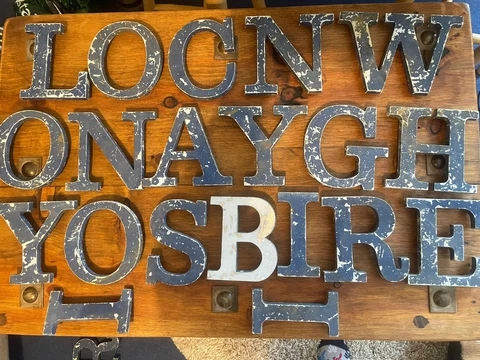 COLLECTION OF  VINTAGE INDUSTRIAL CAST METAL LETTERS…25 IN TOTAL Cover