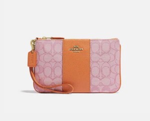 pink and orange coach bag