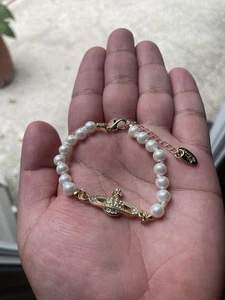 Vivienne Westwood Gold White Pearl Bracelet - Picture 1 of 1
