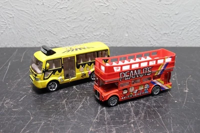 Lot of 2 Peanuts Snoopy Die-Cast Metal Buses Yellow & Red - Image 1 of 4