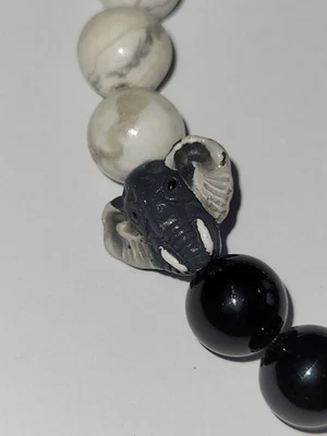 Pulsera Howlite Negro Ónix Cuentas Elefante Dije Elástico Piedra Curativa Joyería Foto 1 de 4