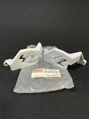 1993-2002 Yamaha YZ250 YZ125 Rear Brake Caliper Guard OEM Part No. 4EW-27491-00 - Image 1 of 3