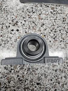 PIEZA DE RODAMIENTO # HCP207-20 1-1/4" I.D. COJINETE BLOQUE ALMOHADA 2 PERNOS - Imagen 1 de 1