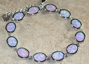 Bracciale ovale in argento elegante opale di fuoco rosa - Foto 1 di 1