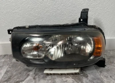 Faro delantero izquierdo del conductor Nissan Cube 2009-14 OEM Foto 1 de 4