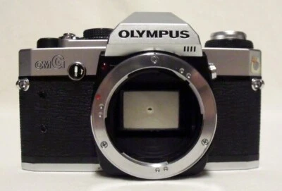 Cuerpo de cámara fotográfica Olympus OMG 35 mm SLR de colección se vende para piezas o reparación limpio Foto 1 de 4